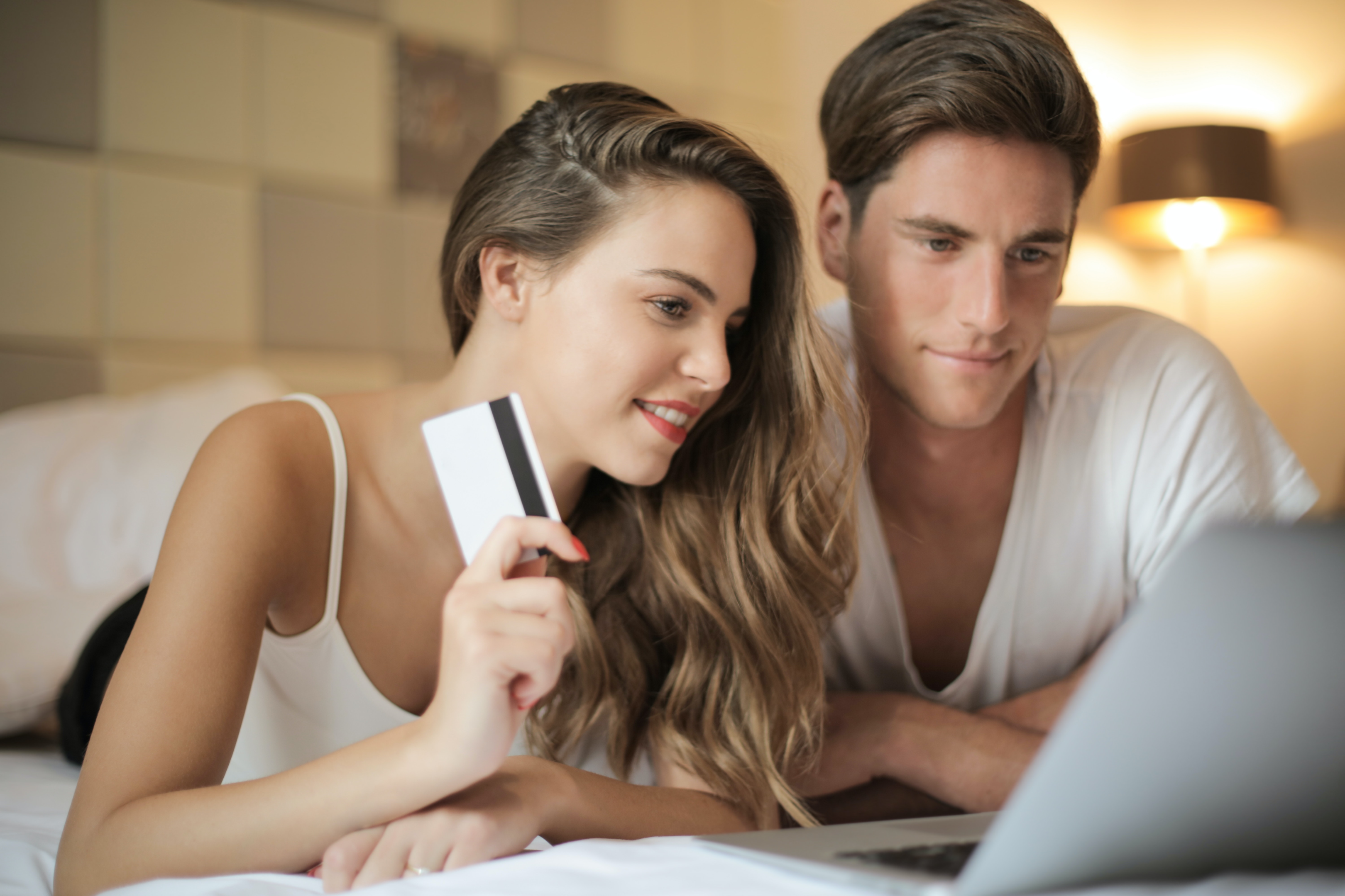 couple paying with credit card