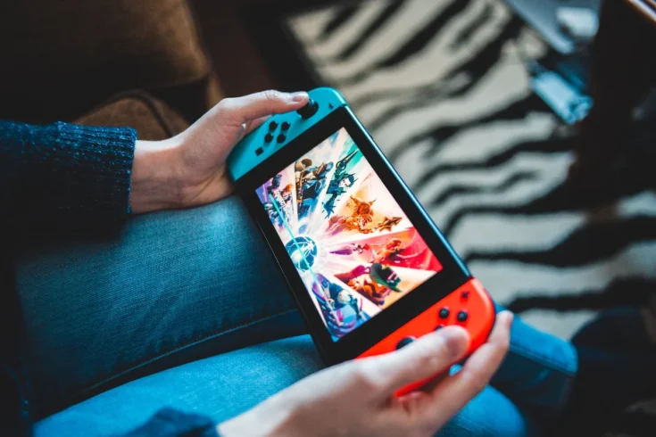 a person playing a game on a nintendo switch