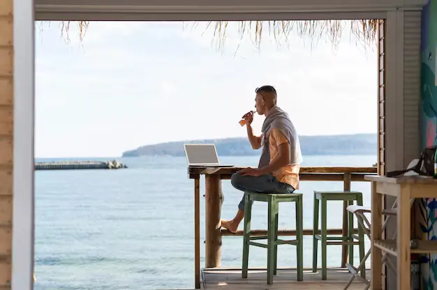 man enjoying seaside view