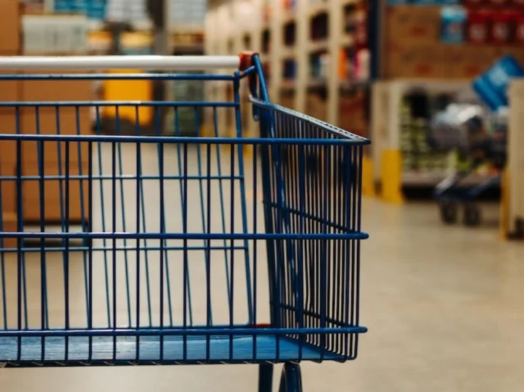 A blue cart stationed at a warehouse corner (which is what you usually see at Walmart)